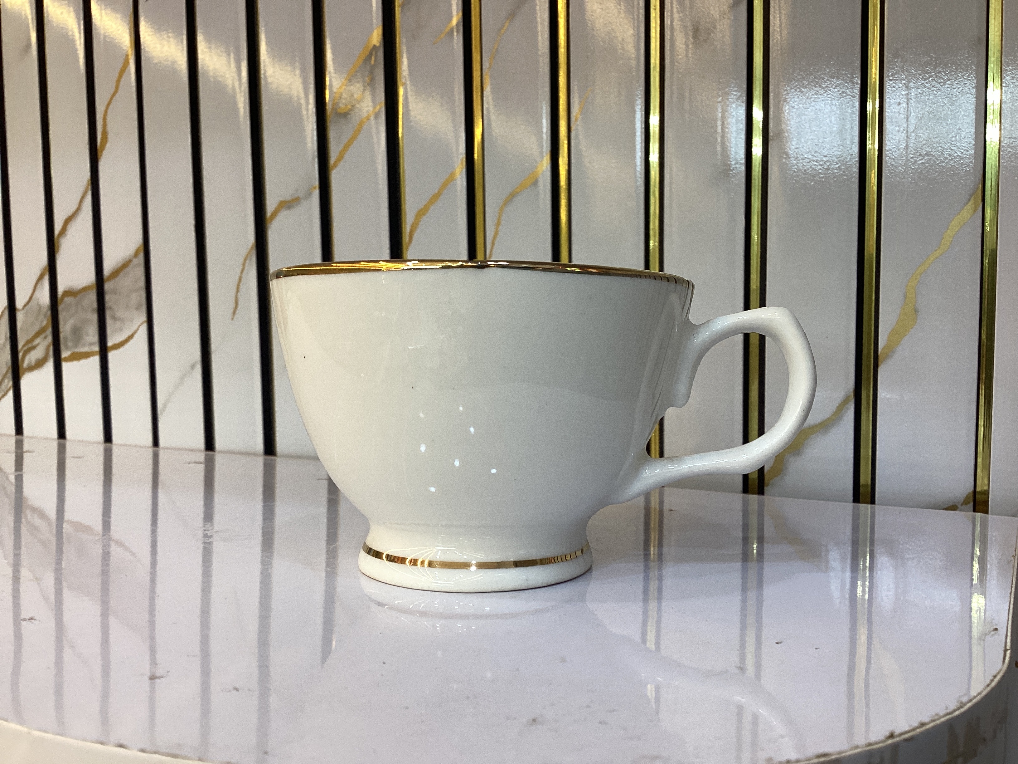 Oasis White Ceramic Tea Cup With Golden Rim