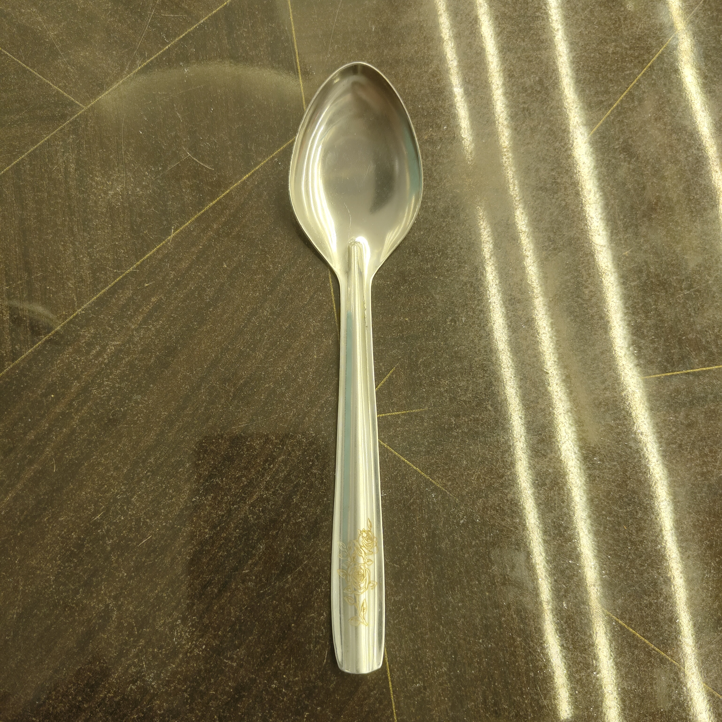 Stainless Steel Spoon With Floral Designed Handle (Length 16 cm)