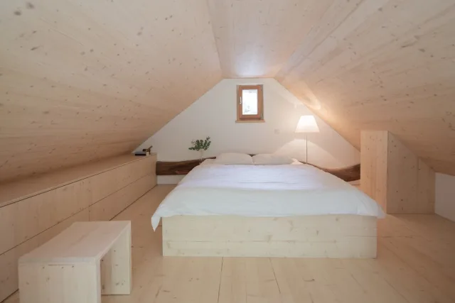 Rustic dining area with stone walls