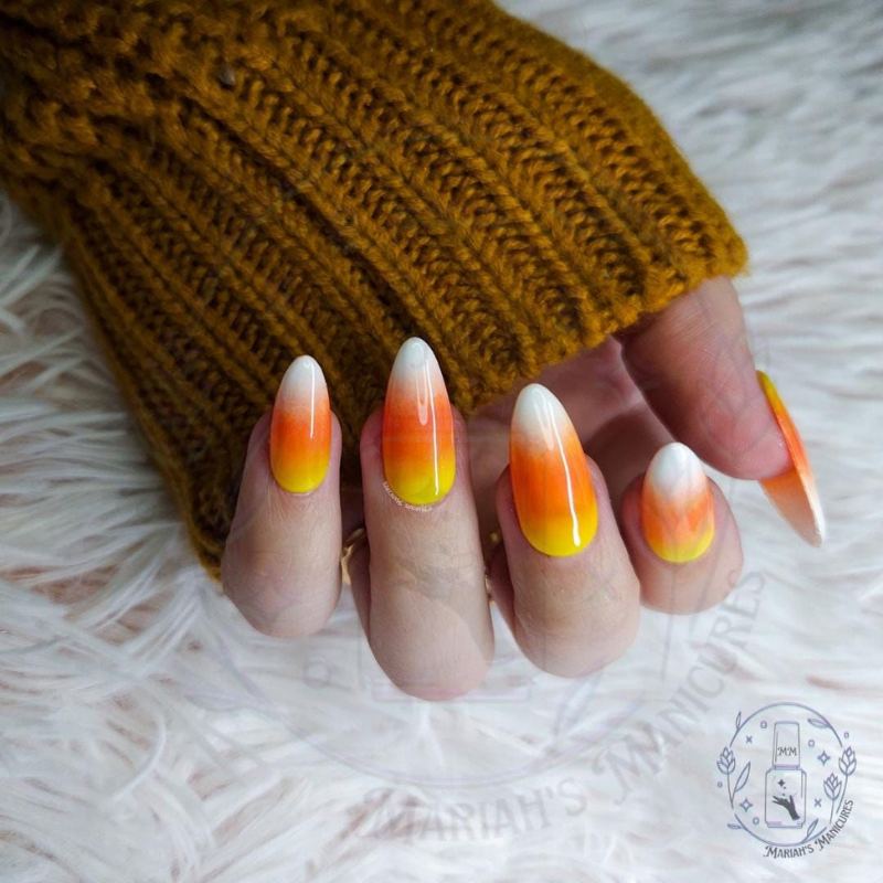 Classic candy corn striped Halloween nails in orange yellow white horizontal bands easy DIY design
