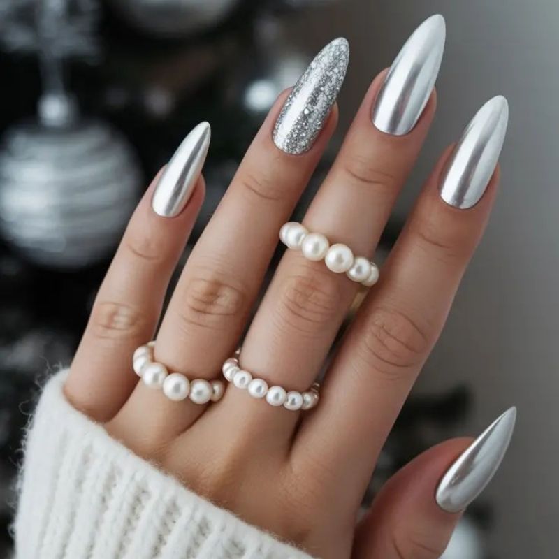 silver chrome christmas nails with hand painted snowflake accent metallic mirror finish on square nails