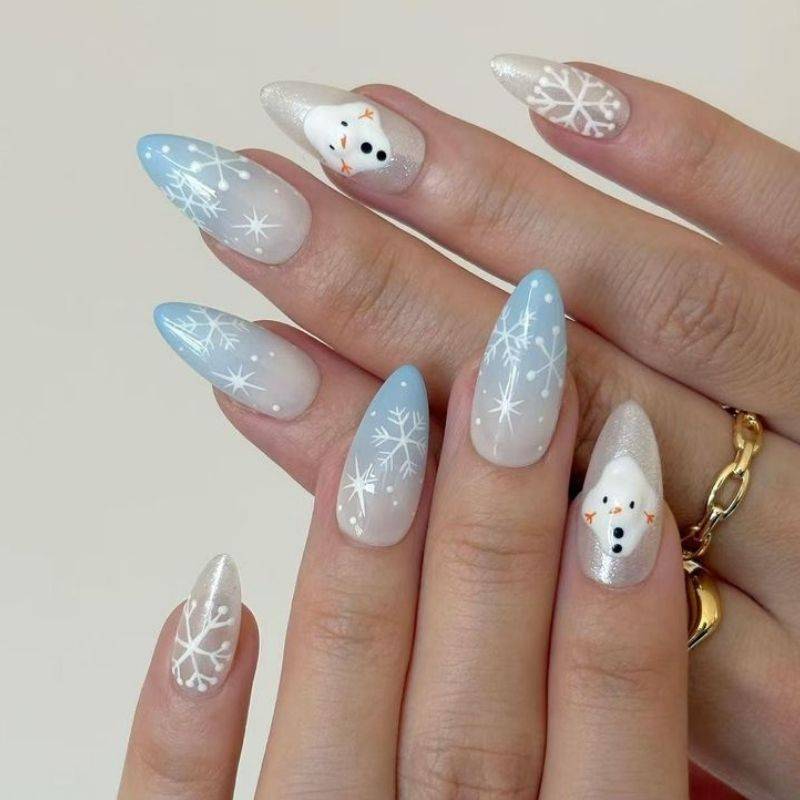 Winter holiday vacation nails with elegant red and gold festive manicure designs