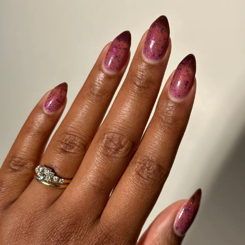 Texture contrast mismatched nails featuring chrome matte and jelly finishes in burgundy tones