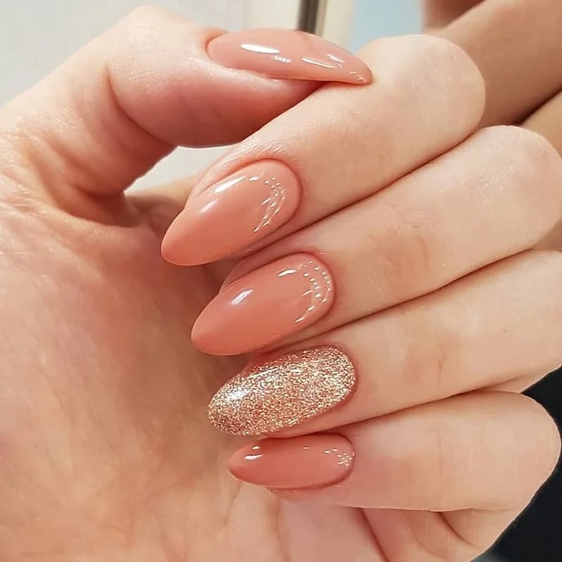Coral salmon and peach nail polish colors demonstrating flattering warm undertones on mature hands