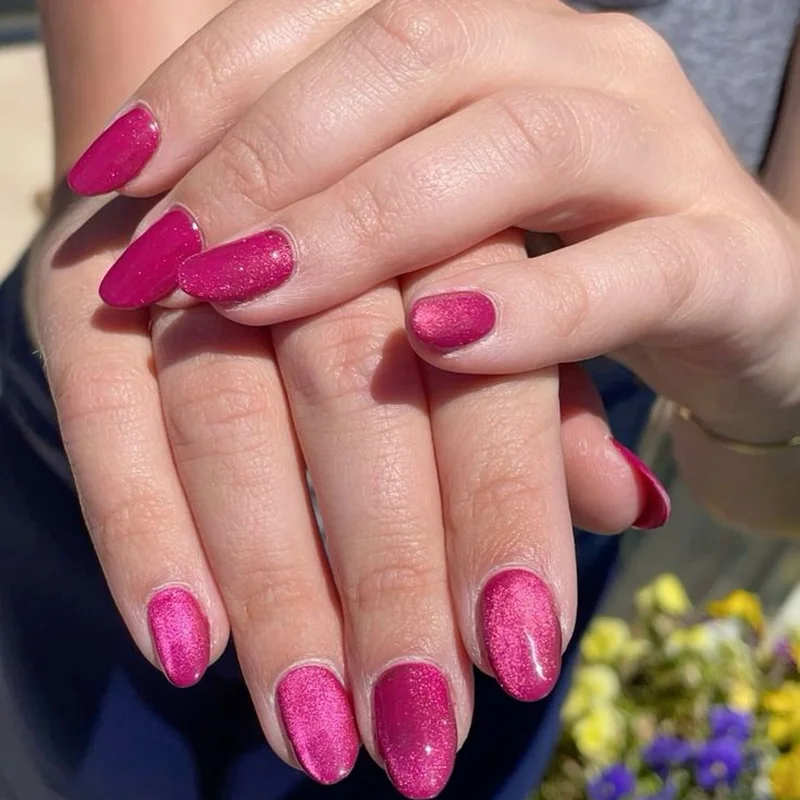 Pink magnetic gel polish application showing proper coat thickness and even coverage technique