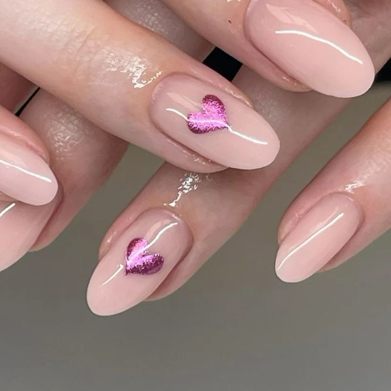 Multiple chrome Valentine nail design variations showing hearts French tips and negative space