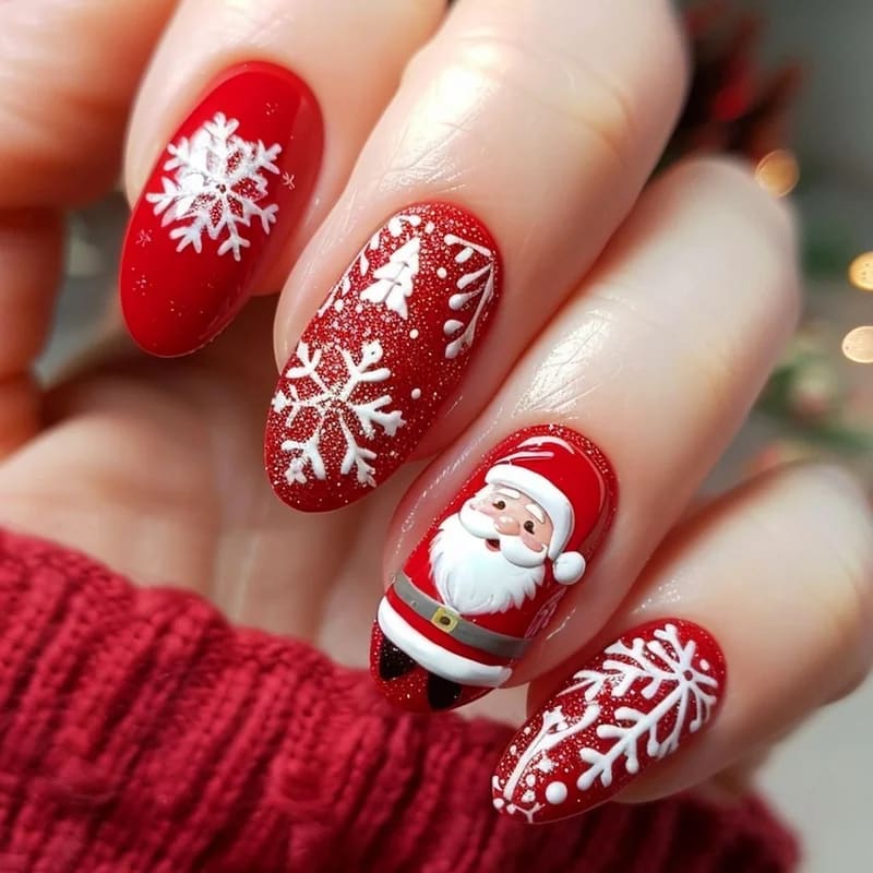 Adorable Santa Claus face nail art with rosy cheeks and white beard on red polish base