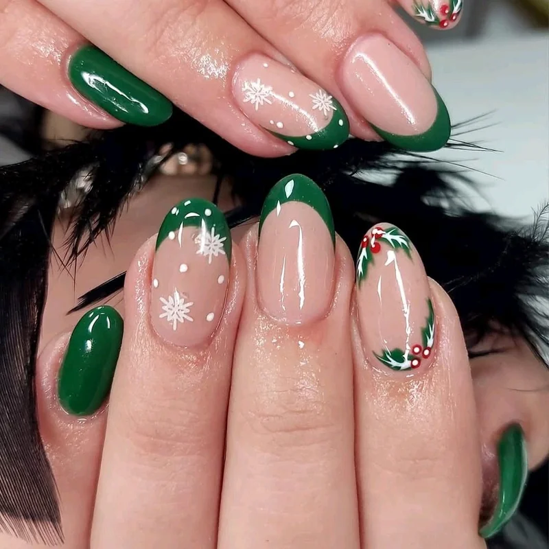short oval christmas nails with forest green polish and gold snowflake accent nail natural length