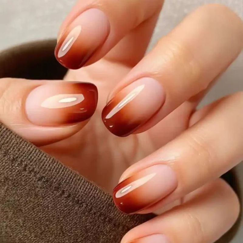 Thanksgiving ombre nails with fall color gradient from red to orange
