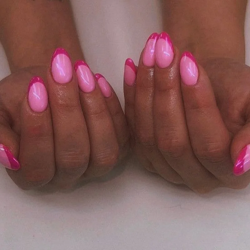 Colored base French tips with pink or red base and white contrast tips