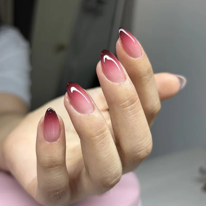Ombré French tips with pink to red gradient valentine transition