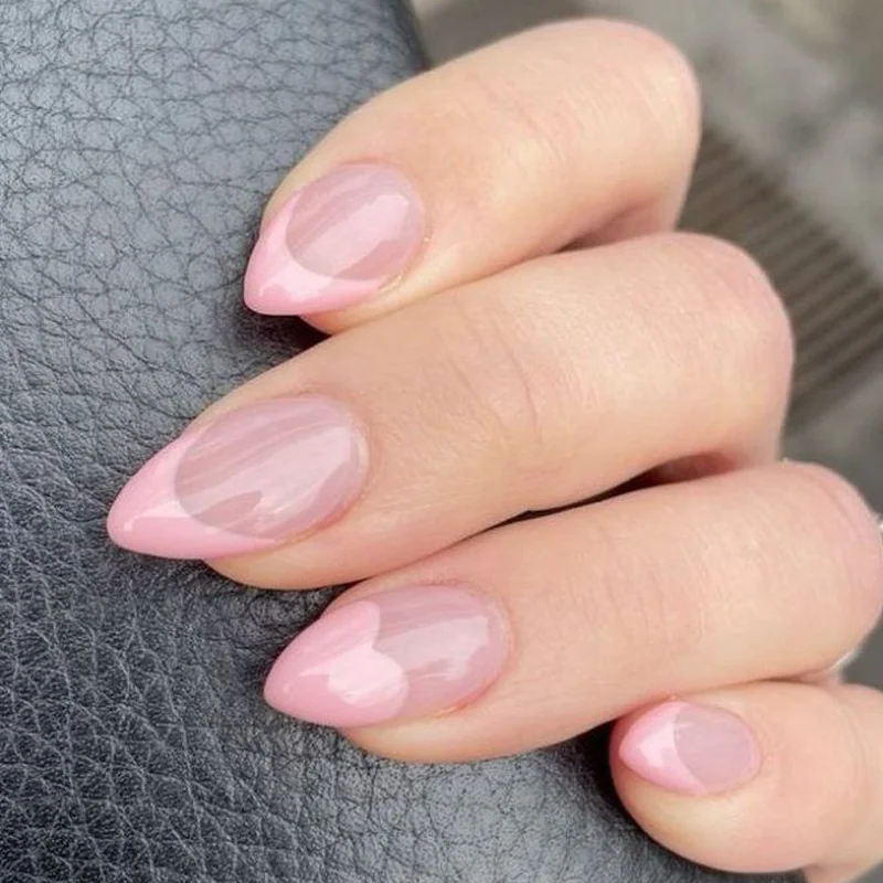 Pink French tips in soft blush shade for romantic valentine manicure