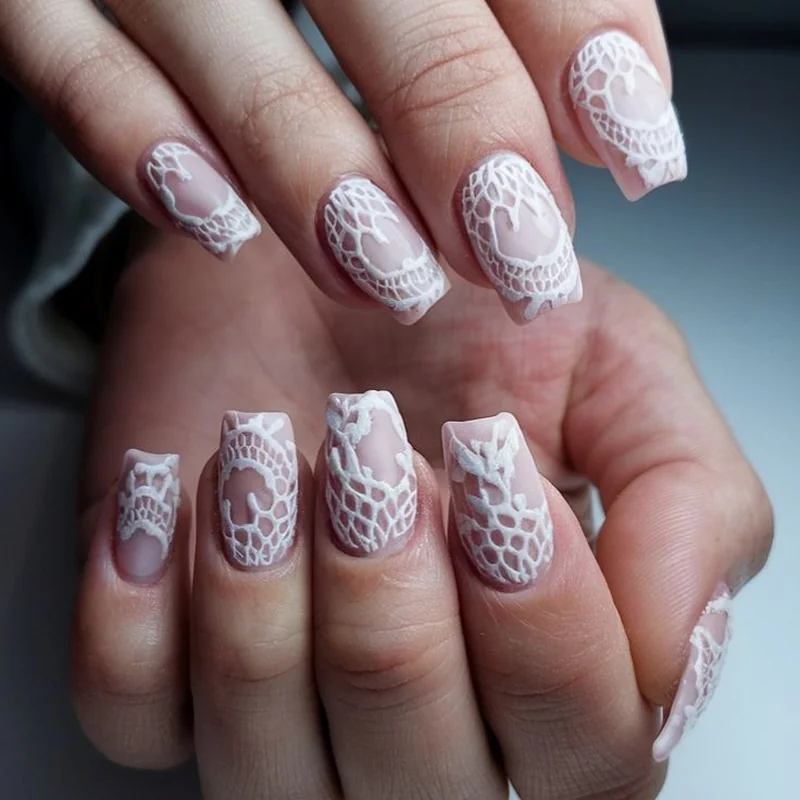 Lace Valentine nails with intricate overlay design