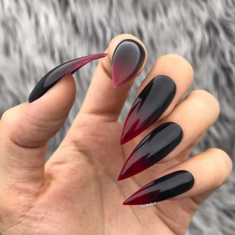 Black to red ombre vampire nail design with gradient