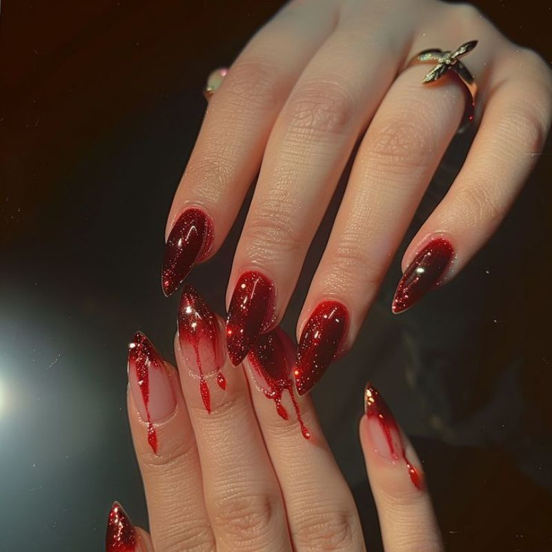 Dripping blood vampire nail design with red tips