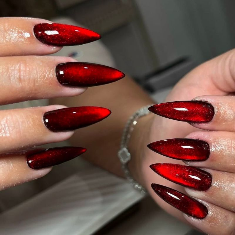 Sparkly vampire nails with red glitter and shimmer