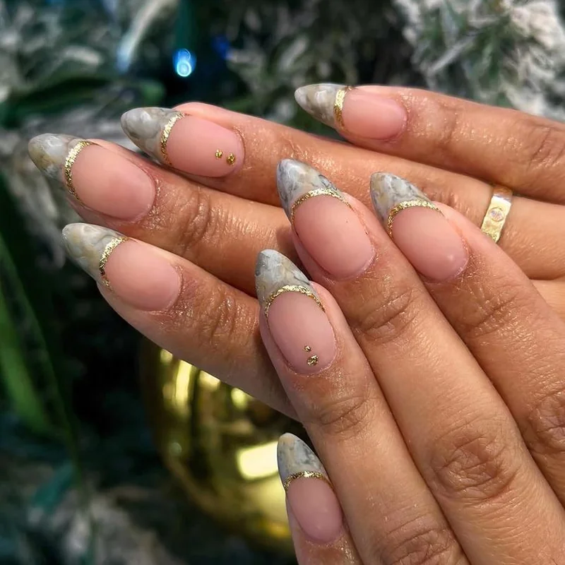 Advanced winter nail art including intricate snowflakes and chrome ombre techniques