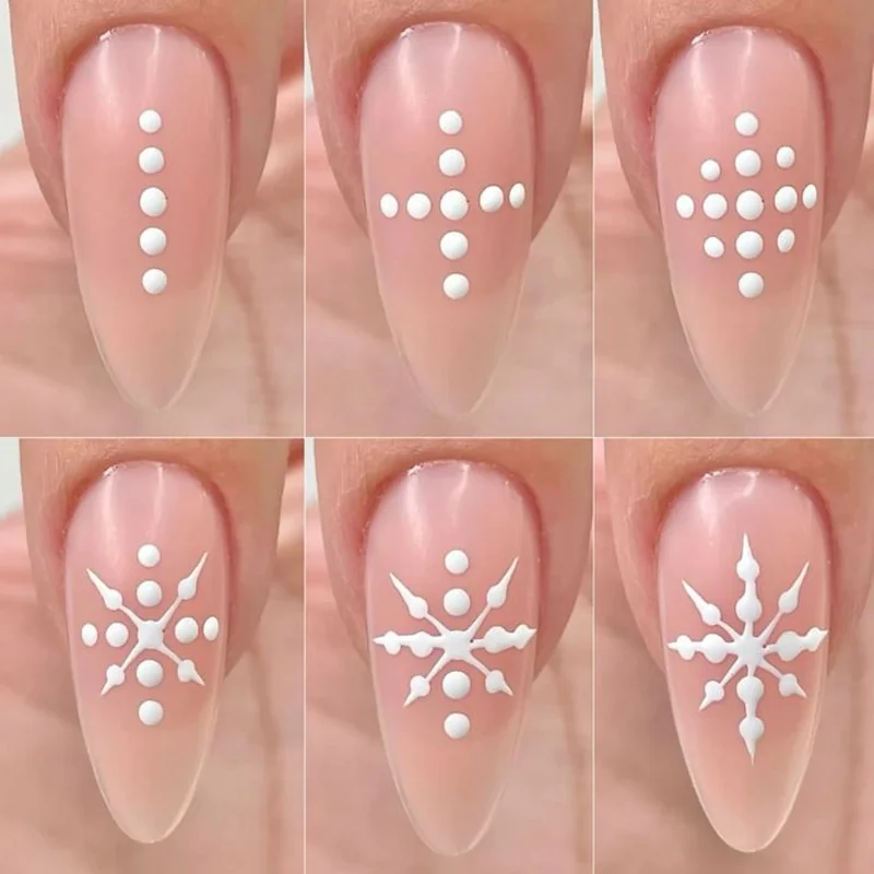 Step by step snowflake nail art tutorial showing technique for creating delicate winter designs