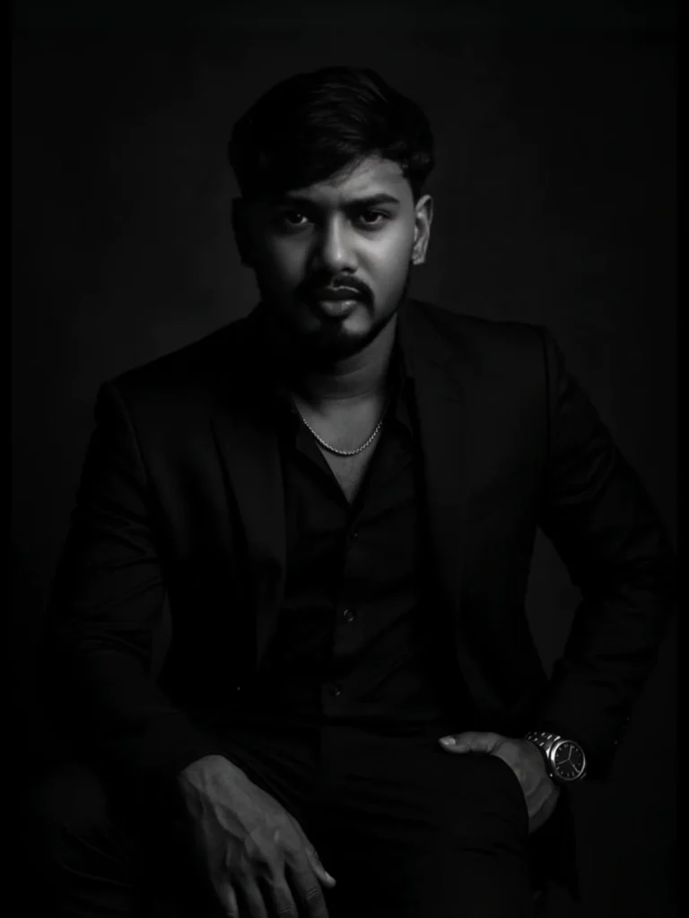 Moody Studio Portrait of a Confident Man in All-Black Suit