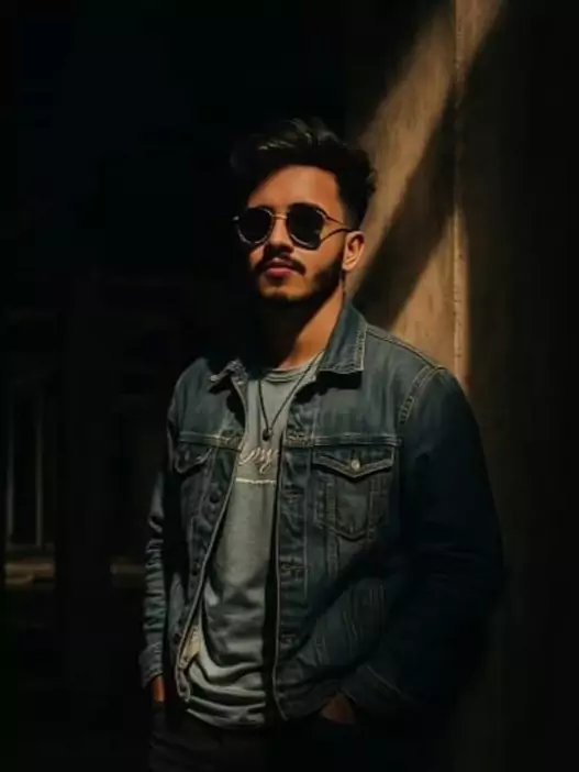 Aesthetic 0.6 Lens Portrait — Boy in Denim Jacket Under Dramatic Spotlight