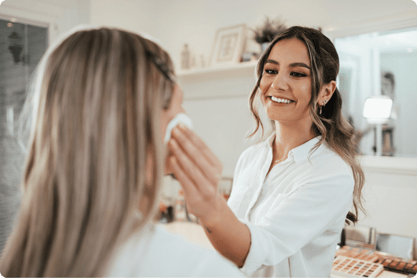 Beauty therapist with client