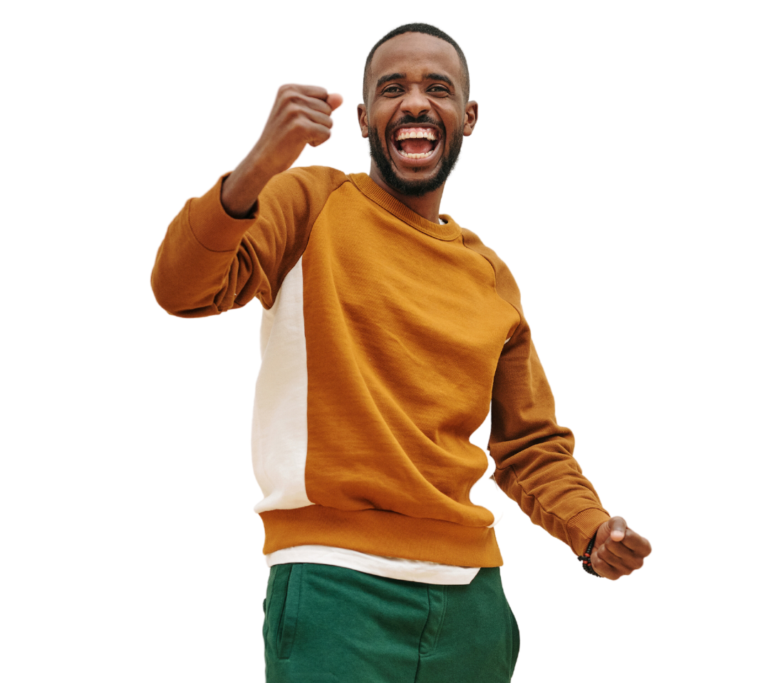 Man smiling and punching fist in air