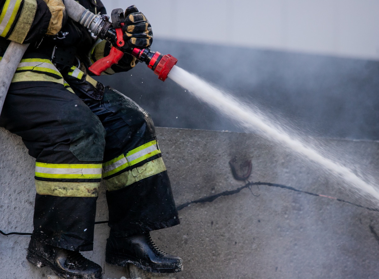 Fire fighter with hose