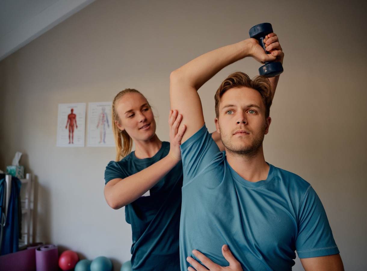 Personal trainer with male client