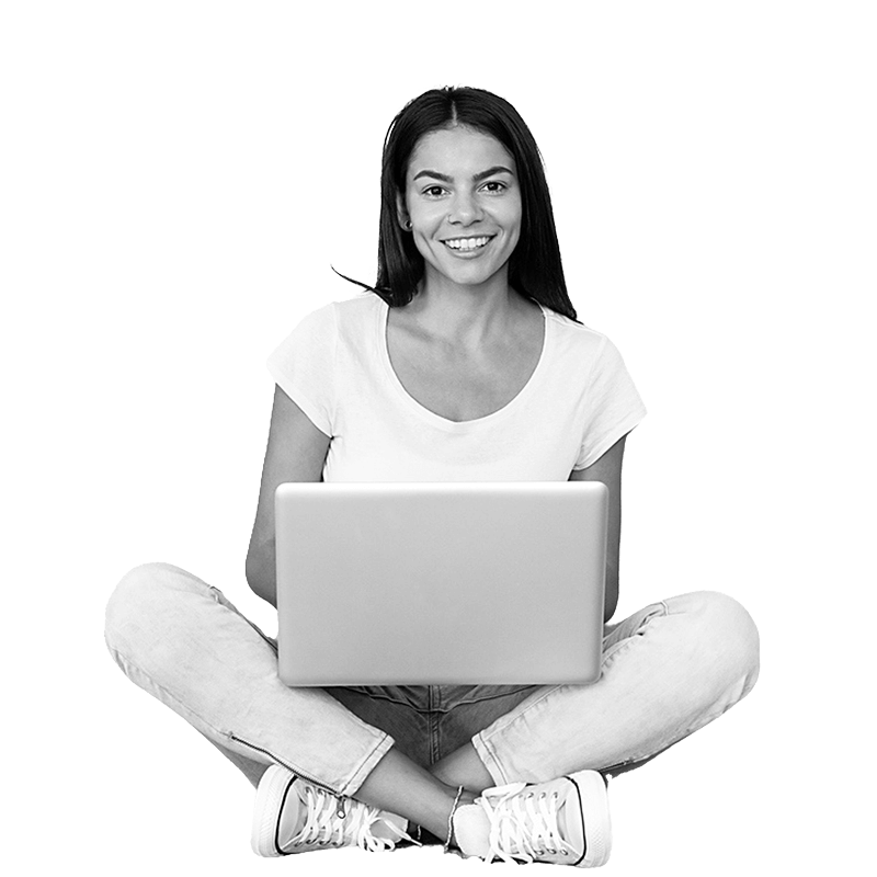 Woman sitting down studying on laptop
