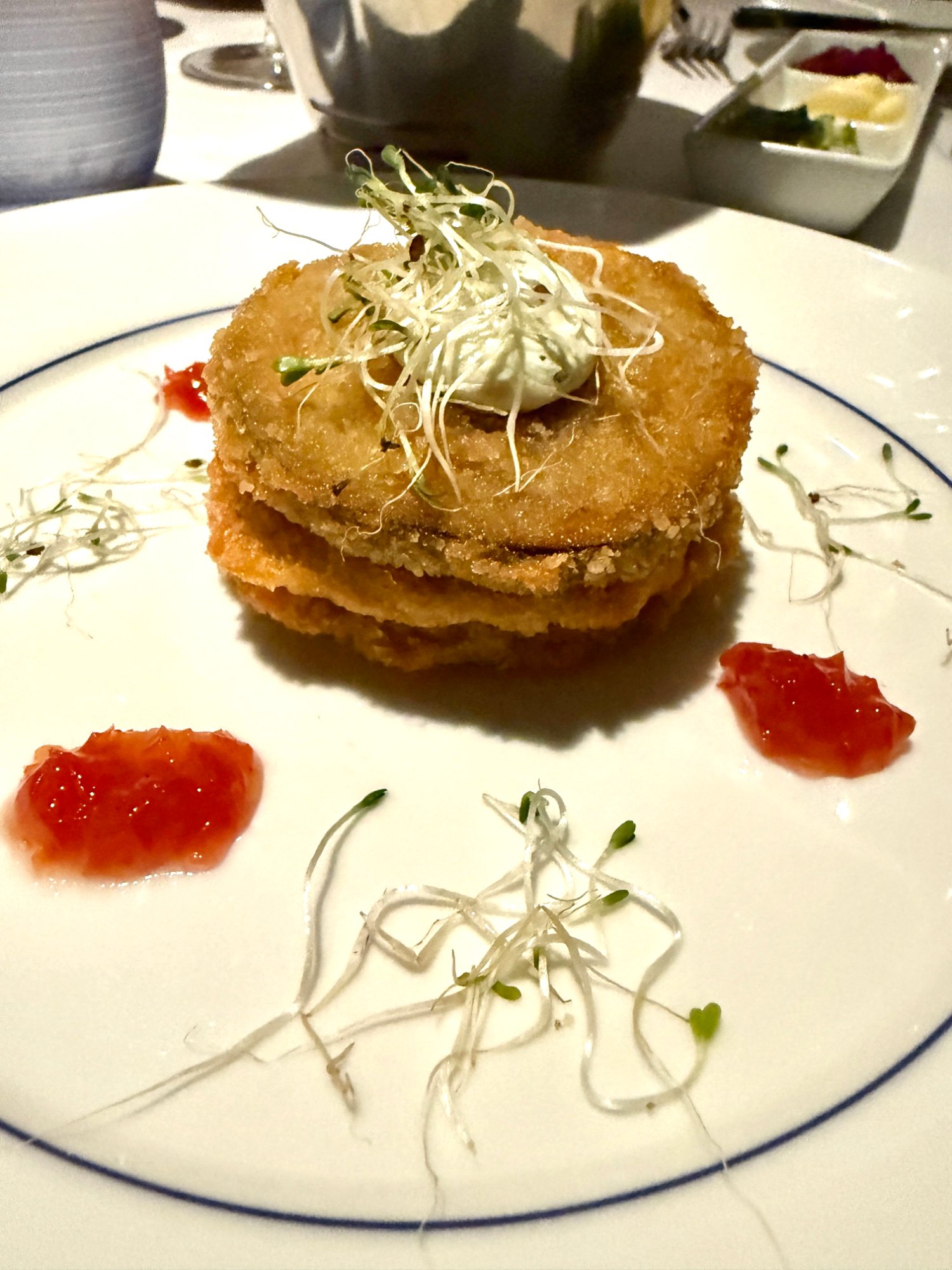 Blu fried green tomato starter with labneh and microgreens