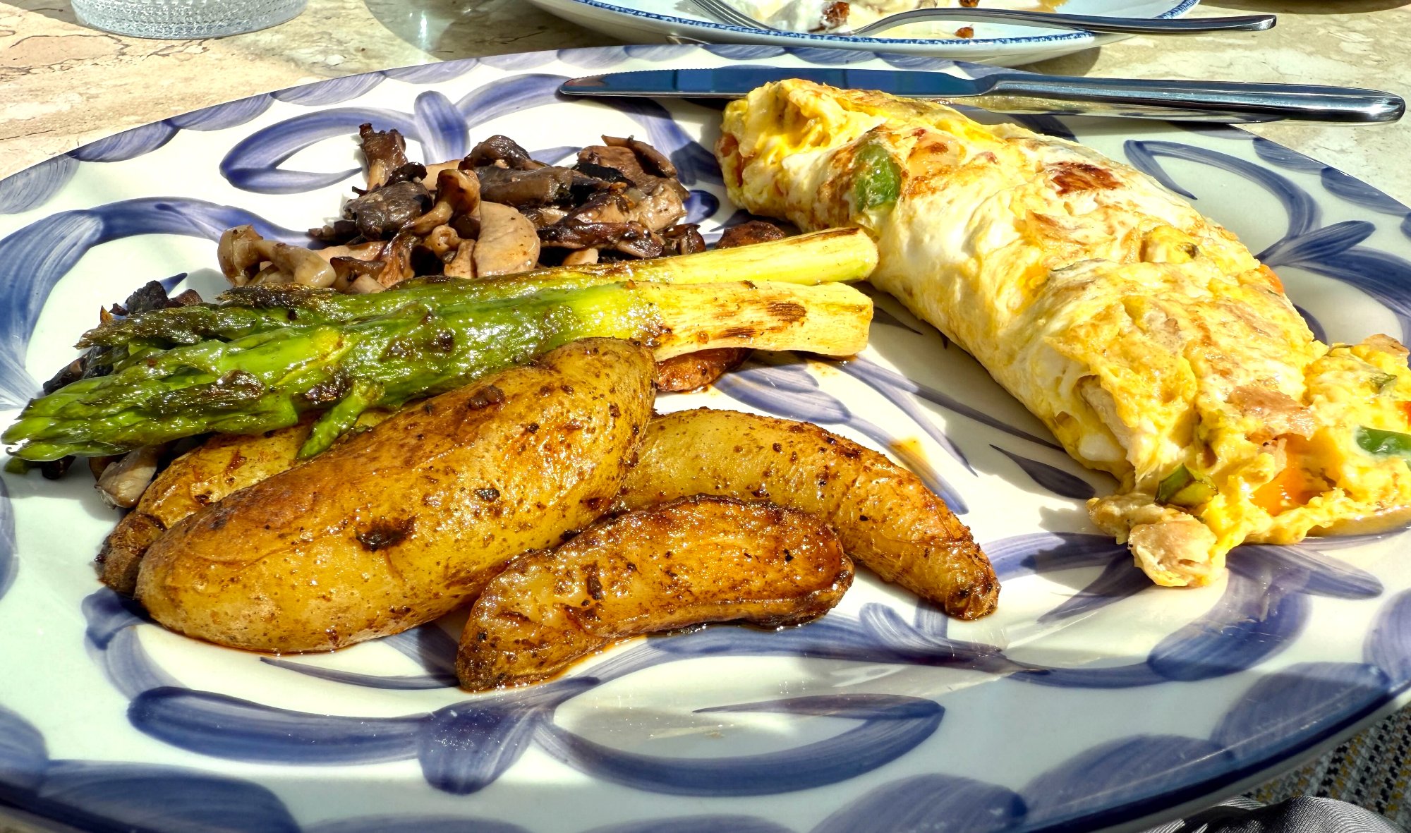 Bora omelette with asparagus, mushrooms and roasted potatoes