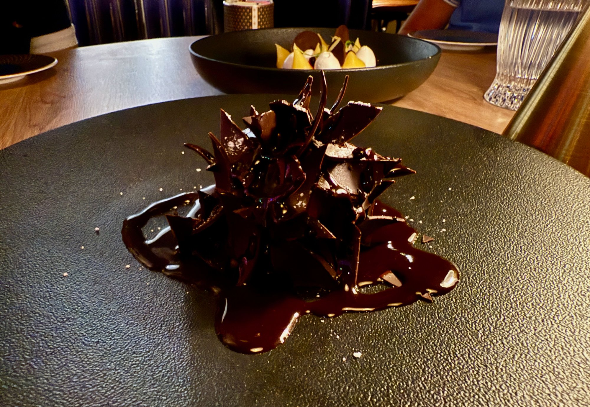 Mosaic dessert — churro bites with chocolate mole