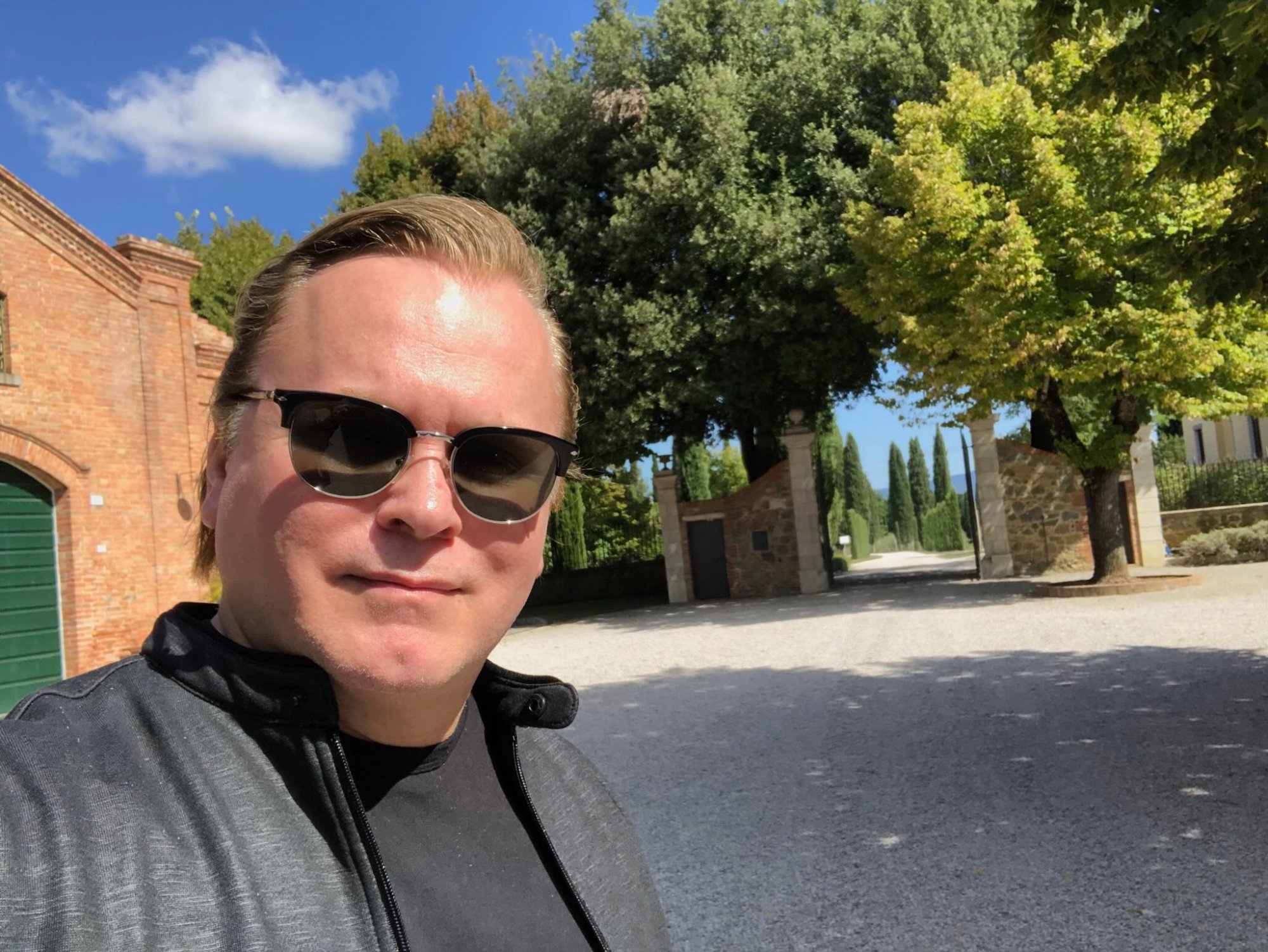 Patrick Raymond at the gates of Avignonesi Winery, Tuscany