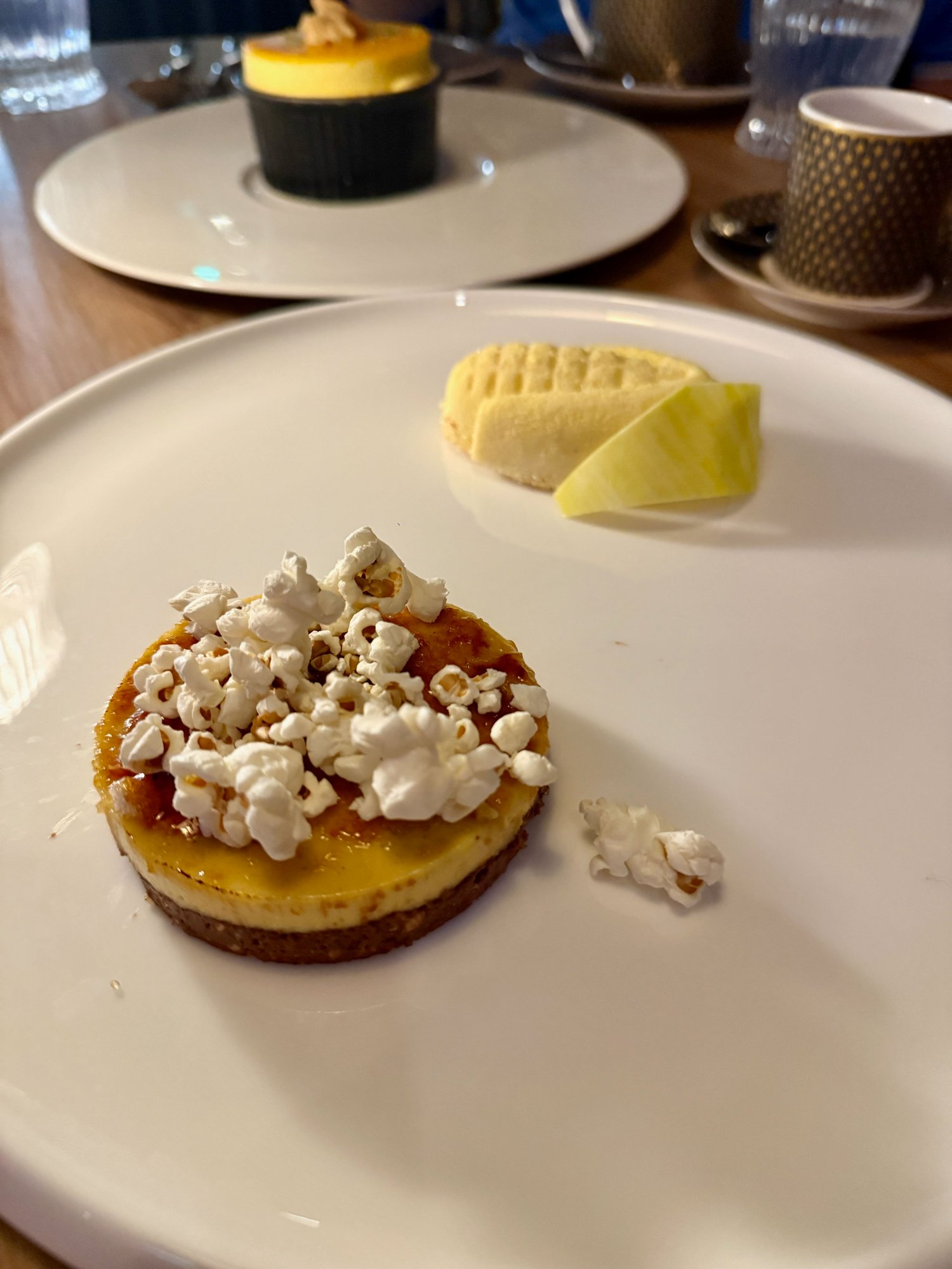 Mosaic dessert — cheesecake tart with popcorn