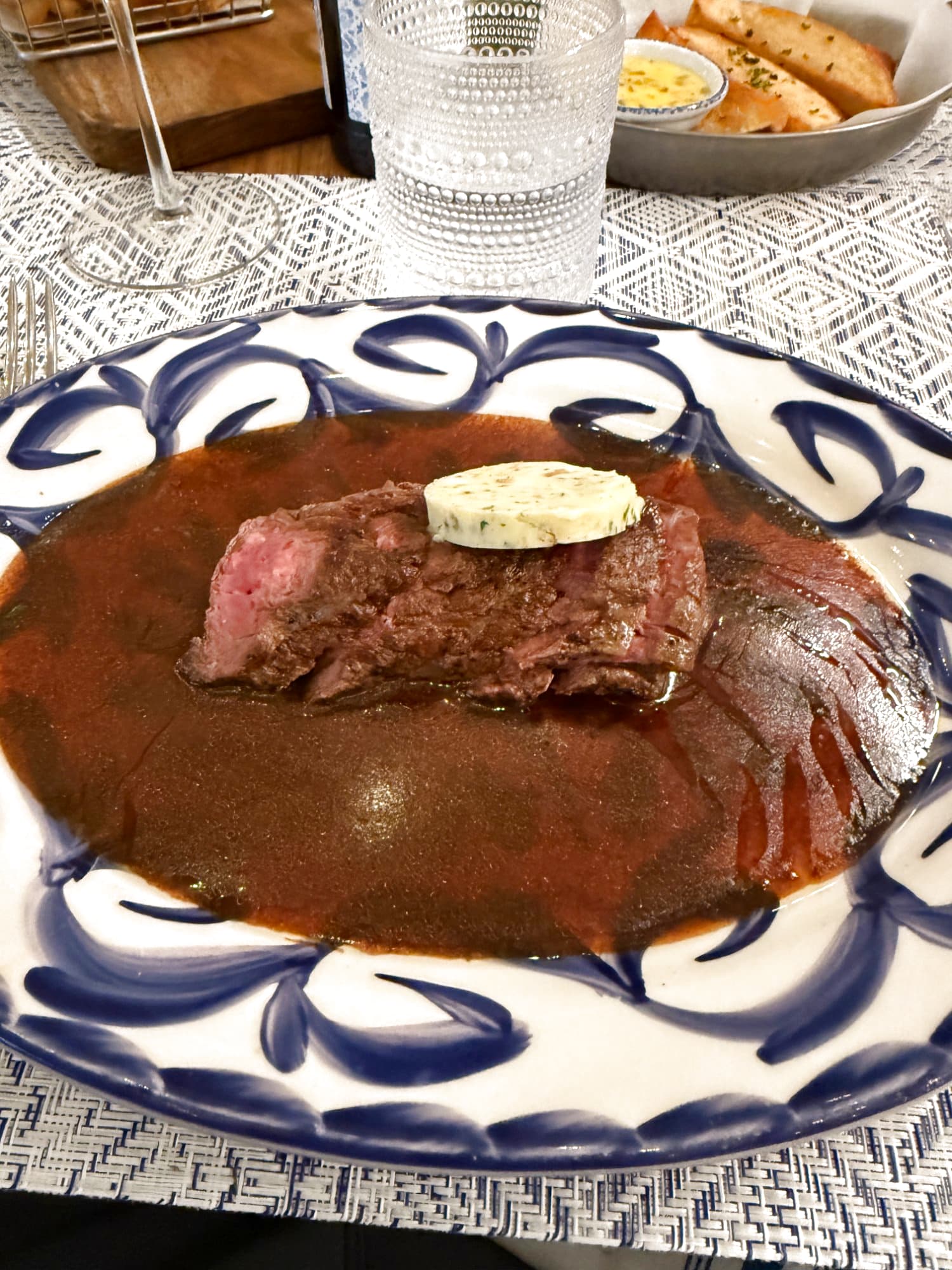 Bora dinner steak a la espalda with herb butter melting on top