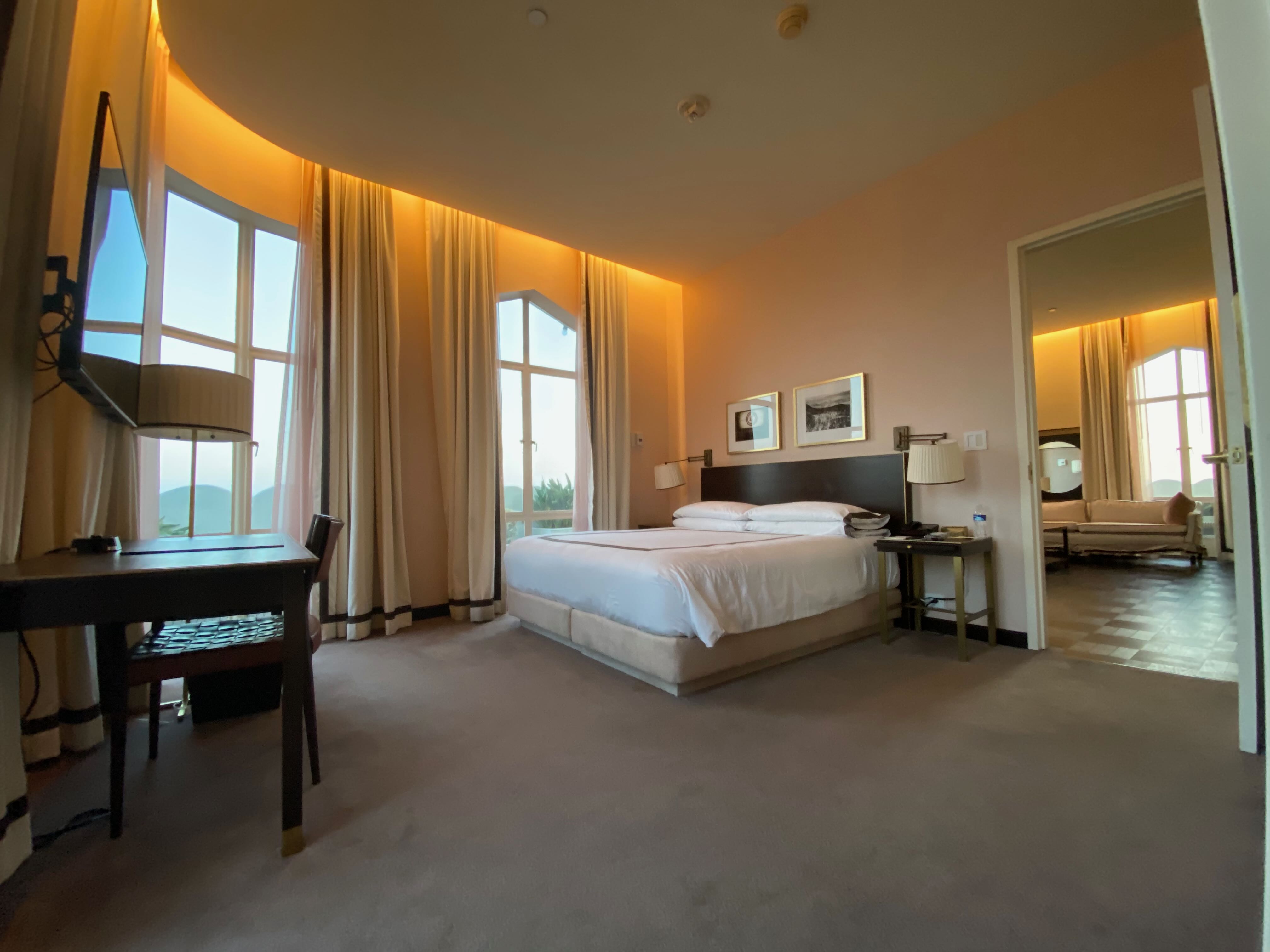 Sunset Tower penthouse bedroom looking into salon and living room