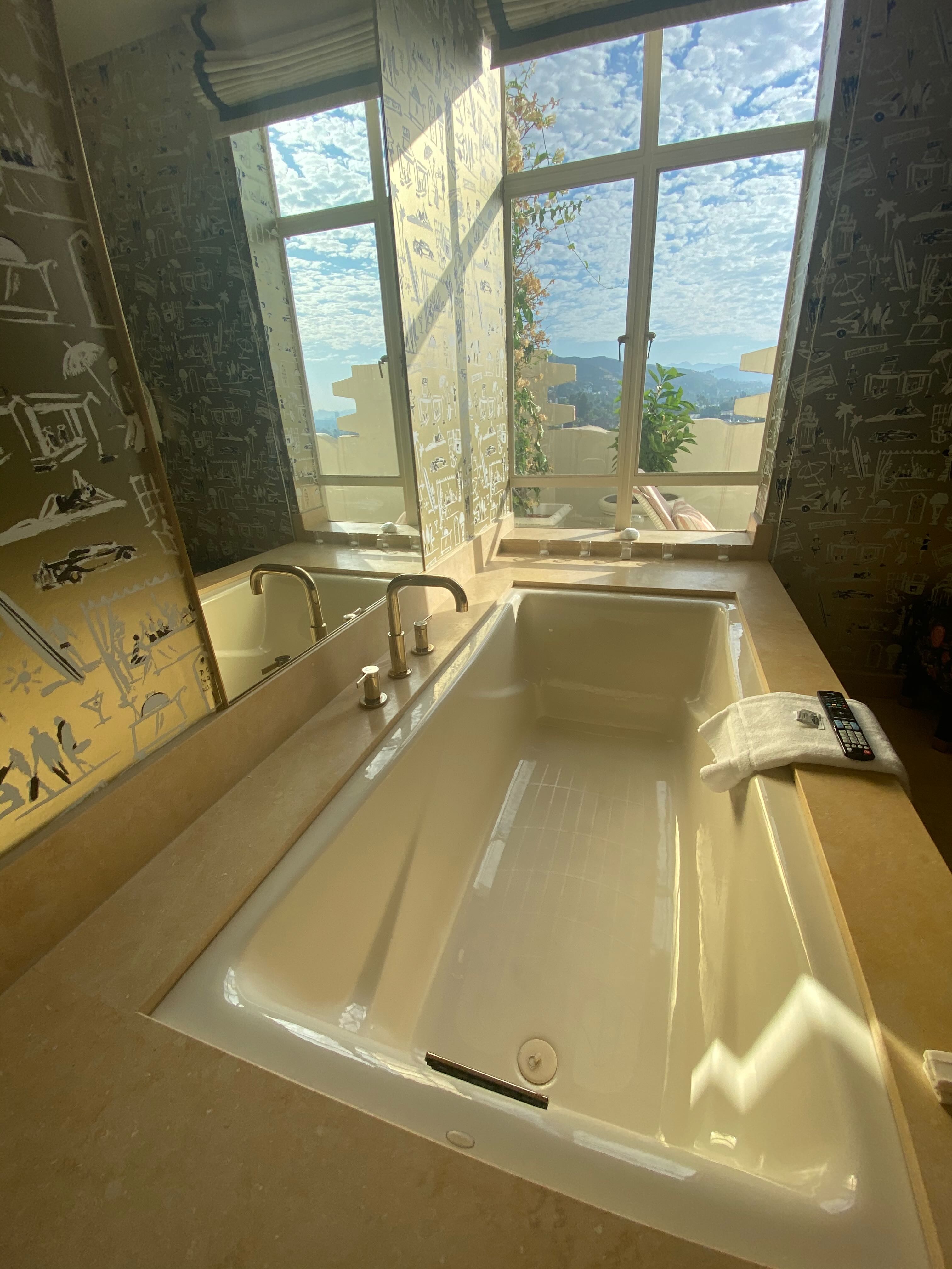 Sunset Tower penthouse bathroom with epic view over West Hollywood