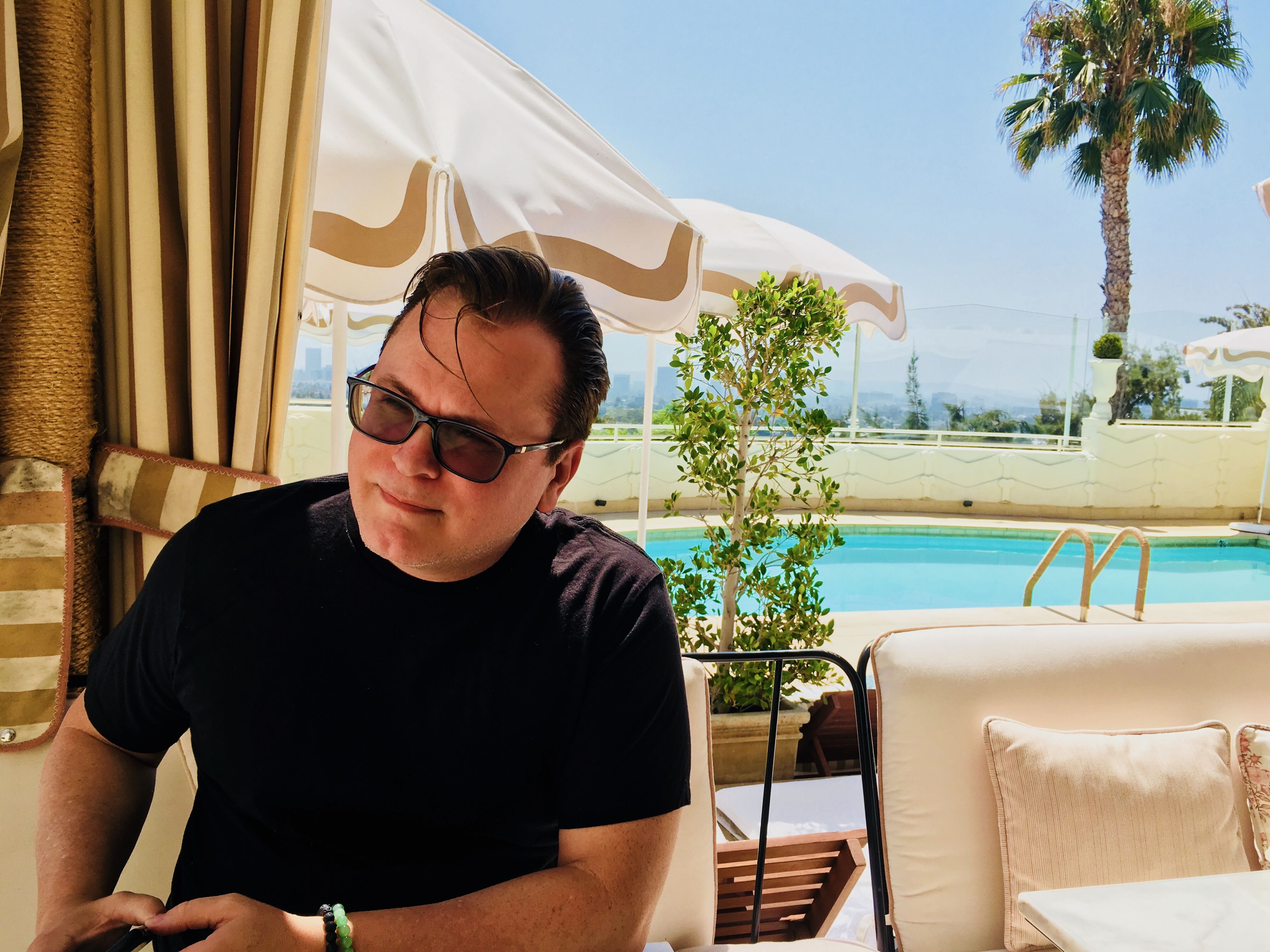Patrick Raymond enjoying an exclusive lunch at the Sunset Tower poolside terrace