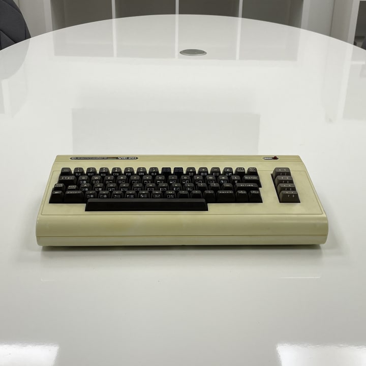 The Commodore VIC-20, launched in 1980, was the first affordable color home computer from Commodore, featuring a 1 MHz 6502 CPU, 5 KB of RAM, and simple graphics and sound capabilities. It gained popularity for its ease of use, large software library, and role in bringing computing to a wider audience.