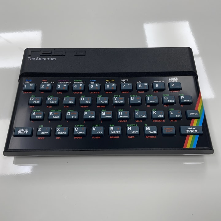 The ZX Spectrum, released by Sinclair Research in 1982, was a hugely popular 8-bit home computer in the UK known for its rubber keyboard, colorful graphics, and affordable price. It played a major role in the early home computing and gaming boom, sparking a vibrant software and developer community.