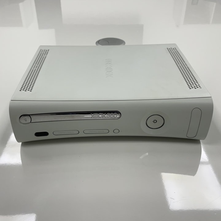 The Xbox 360, released by Microsoft in 2005, is a seventh-generation gaming console known for its extensive Xbox Live online network and diverse game library. It featured improved graphics performance and multimedia capabilities, becoming a major success in the console market.