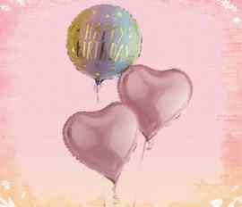 Pink coloured birthday balloons 