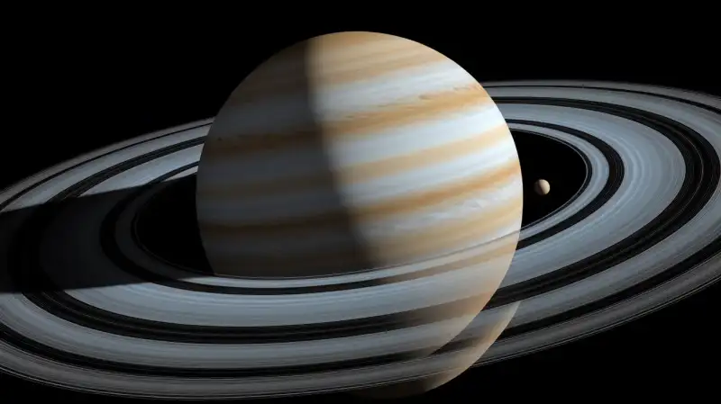 O lună pierdută ar fi putut crea Titan și inelele lui Saturn