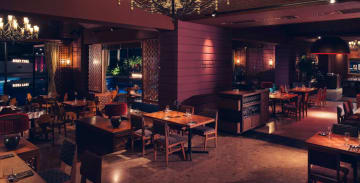 開放感あふれる上質なダイニング空間 | 【アニバーサリーディナープラン】アラカルトで人気のラインナップが楽しめるイタリアンコース★リゾート感溢れる福岡のTHE LUIGANSで極上のひとときを★