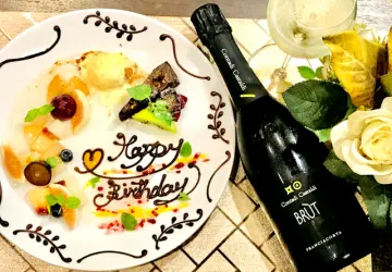 記念日にぴったりの各種サプライズをご用意 | 【アニバーサリープラン】目の前で仕上げる演出のお料理が人気のコース！お祝いのプレート付きとお手土産付き！