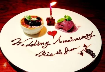 メッセージ付きプレートで感動のサプライズを | 【最大6名×お祝いプラン】厳選食材を使用した天ぷら×シャンパンで祝うおまかせディナー＋ご希望の方にメッセージ付きプレート★北新地駅から徒歩2分