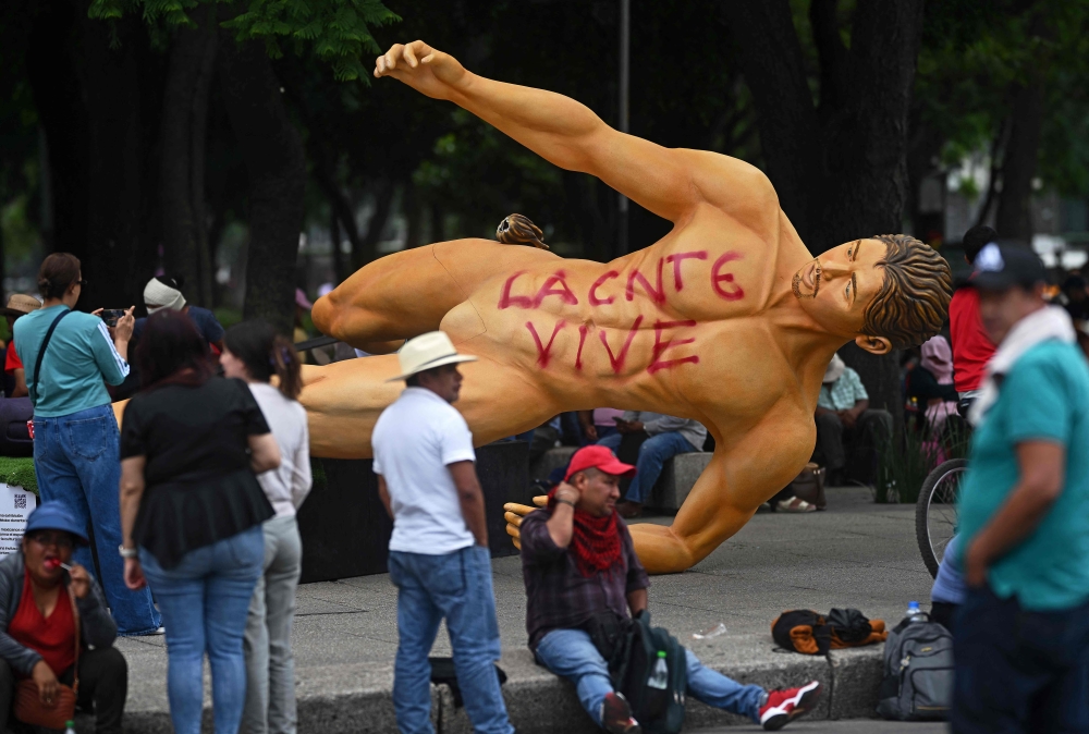 Mexico Teachers Topple World Cup Statues, Threaten Wider Protests Days Before Tournament Kick-Off