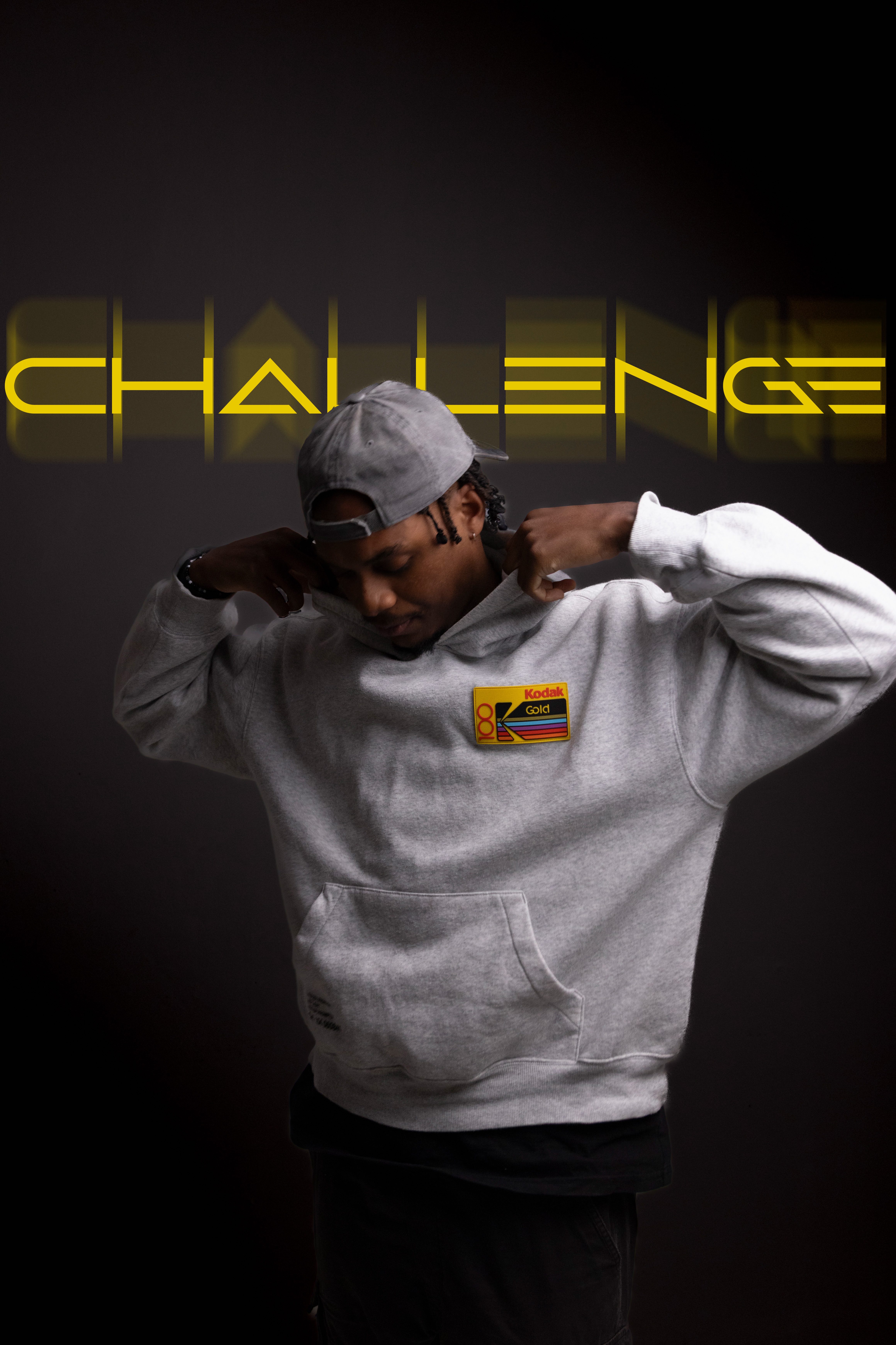 Stage lighting highlighting DJ Challenge during an AfroSanctuary set.