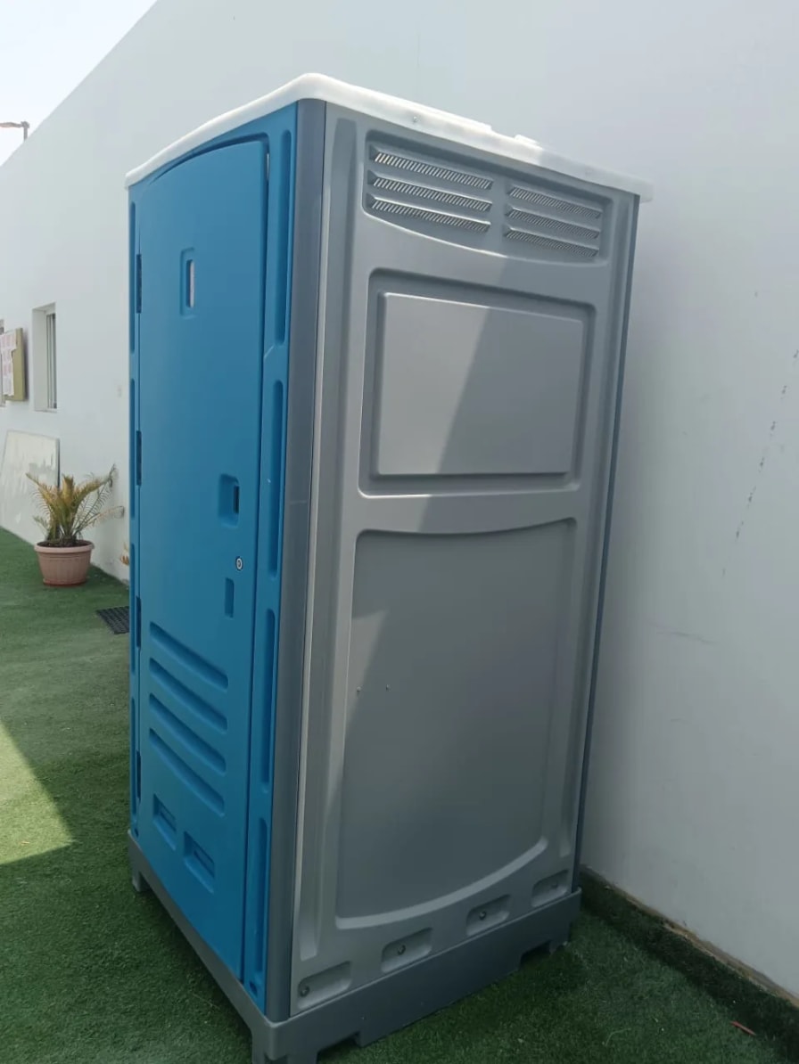 Blue and grey plastic portable toilet close view