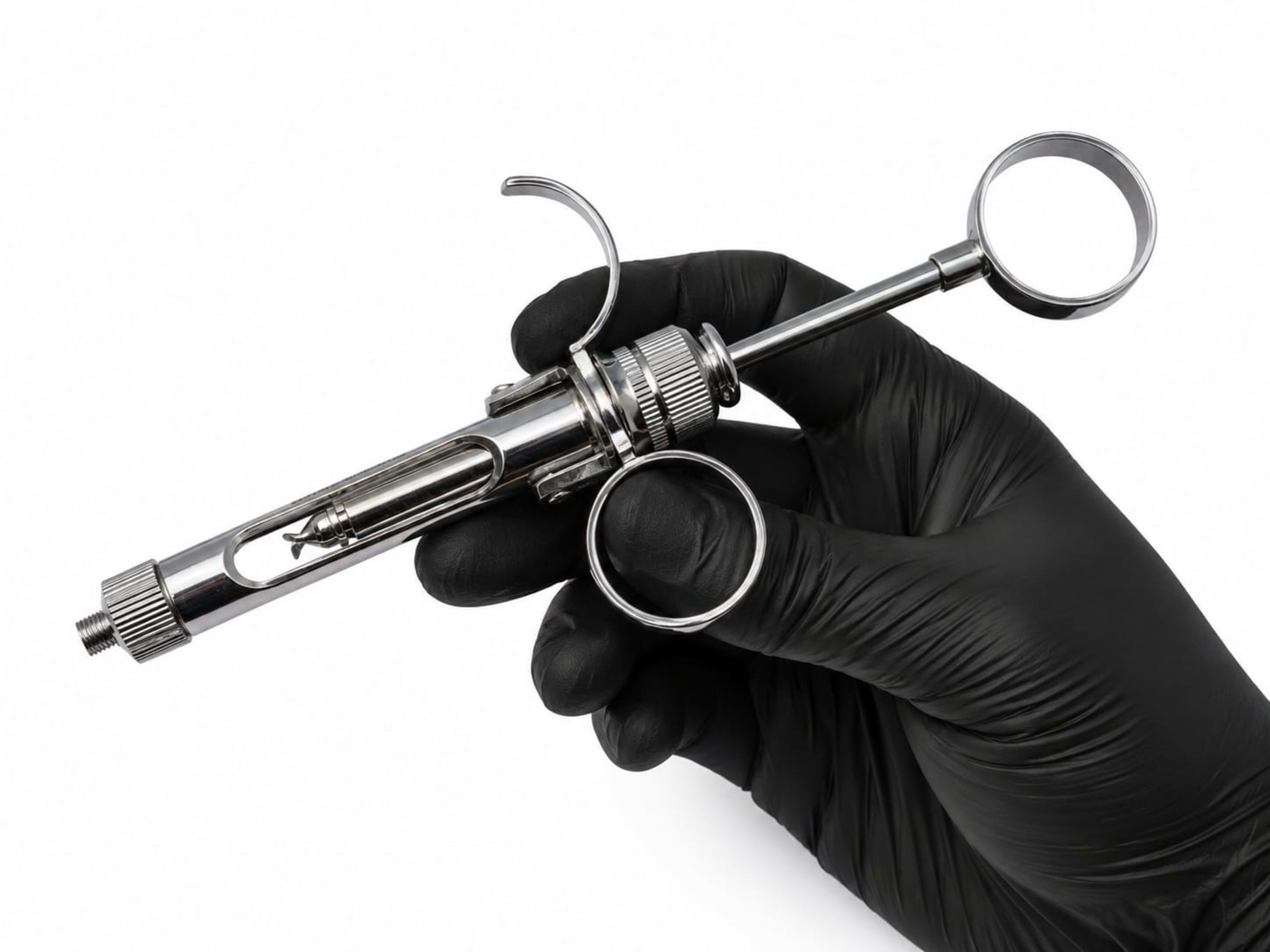 Aspirating metal syringe